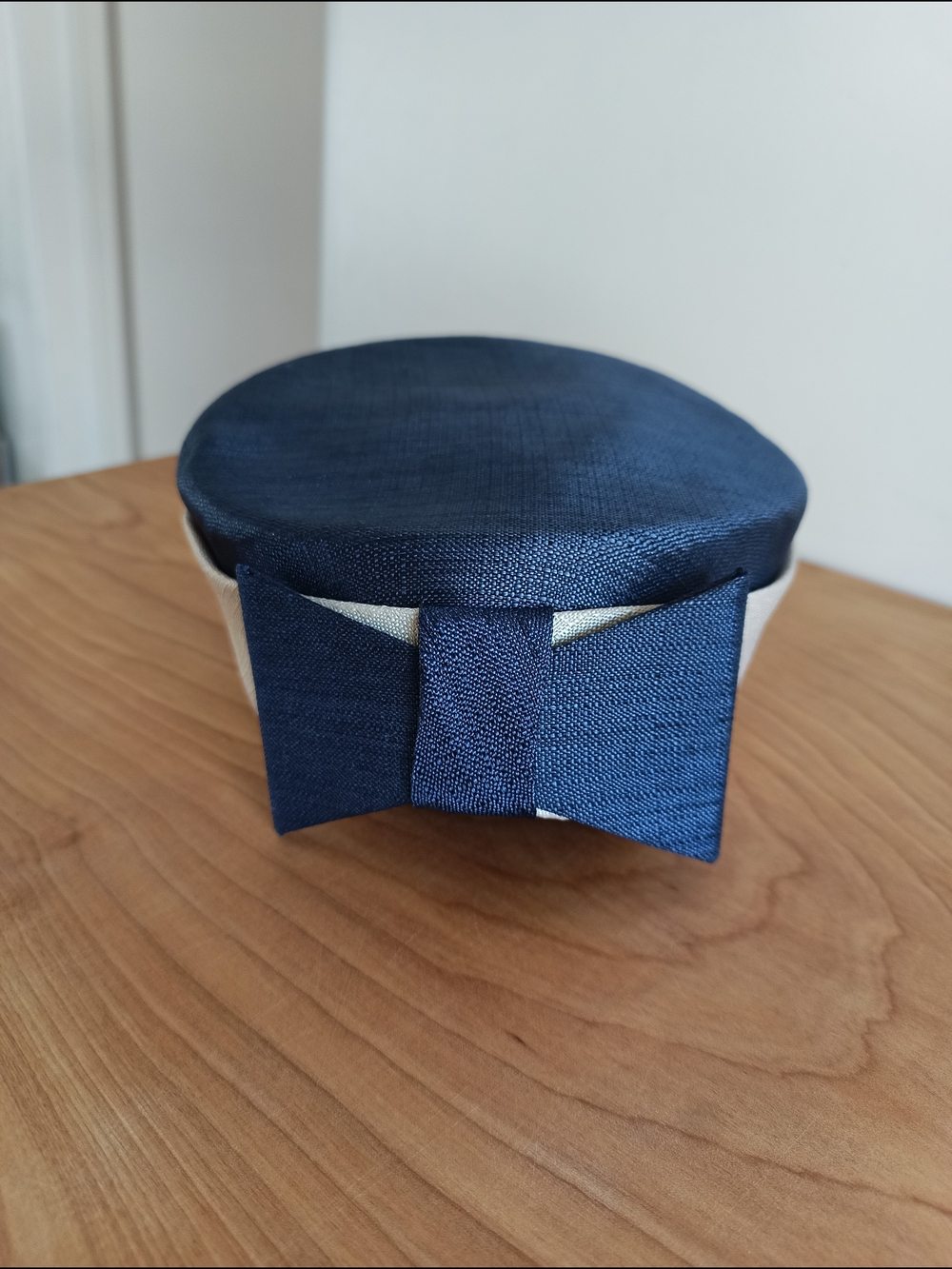 Women's Navy Blue And Beige Pillbox Hat with Bow Accent